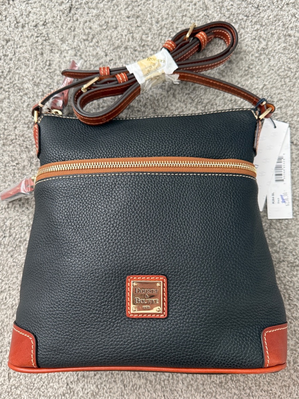 Dooney & Bourke Black Pebble Leather Crossbody with Brown Trim and Gold Hardware